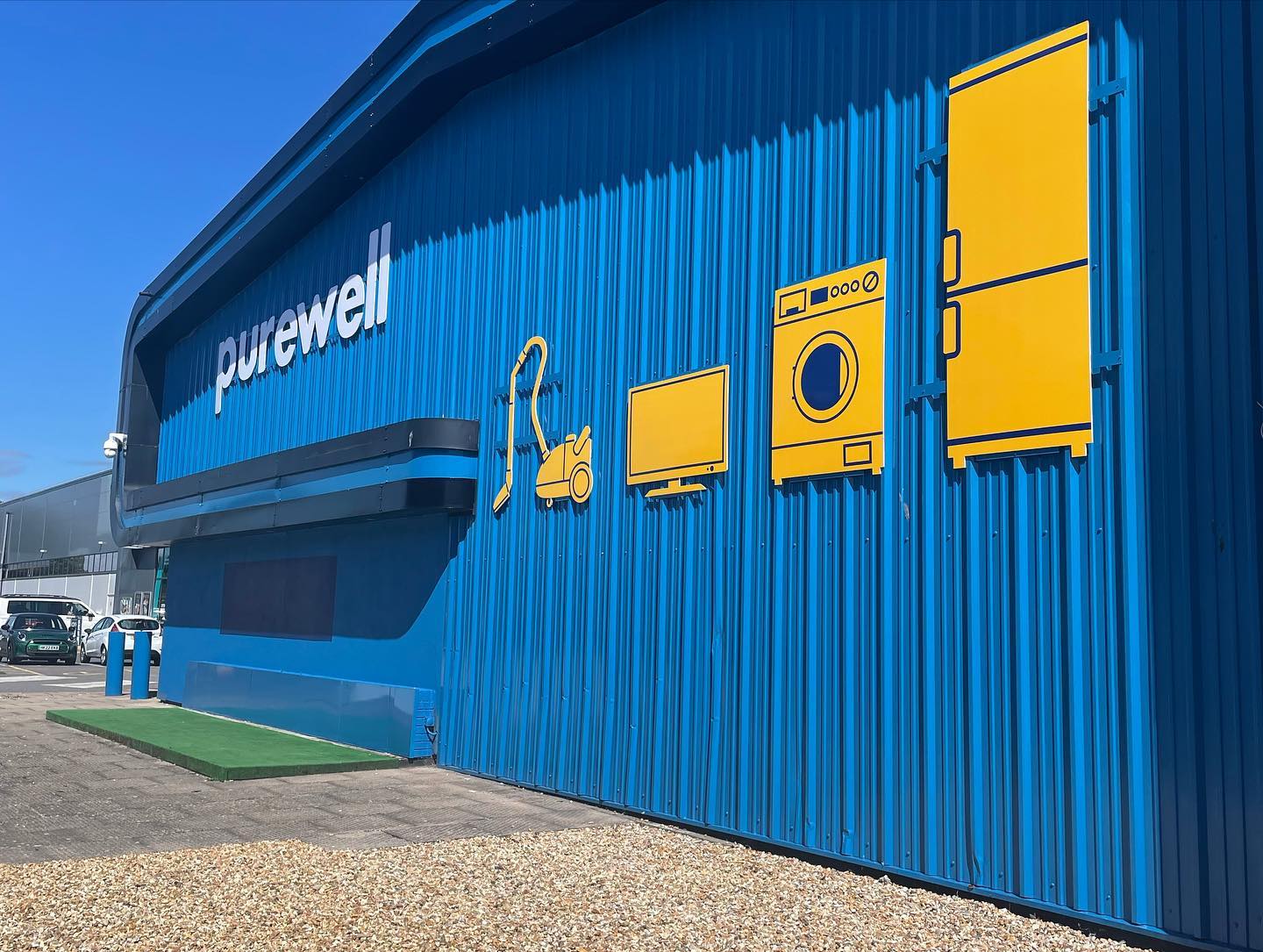 Purewell Shop Front in sunshine.